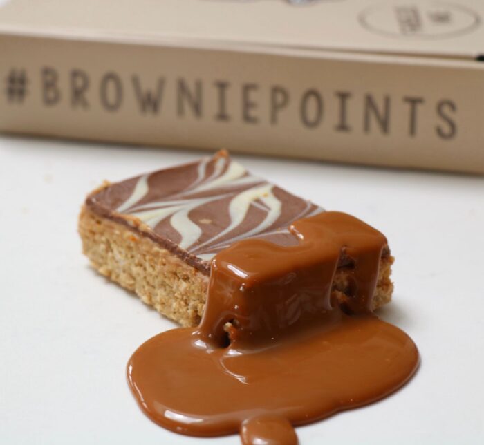 protein flapjack covered in chocolate and biscoff sauce
